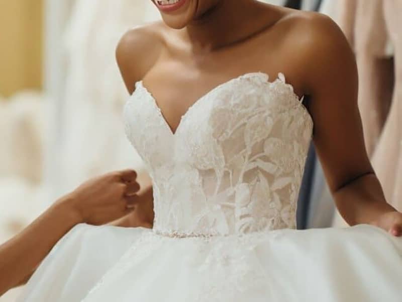 Can a ball gown style wedding dress be taken in or let out?